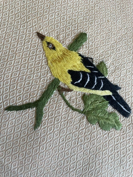 A lovely unused peach coloured Hand towel, embroidered with a bird Carousel 1