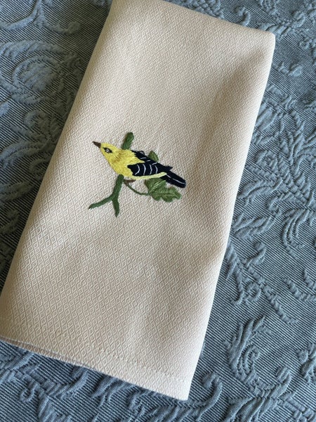 A lovely unused peach coloured Hand towel, embroidered with a bird Carousel 2