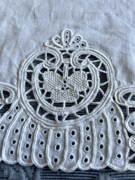 A beautiful white linen cloth - very heavily embroidered and perfect Carousel 2