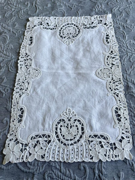 A beautiful white linen cloth - very heavily embroidered and perfect Carousel 1