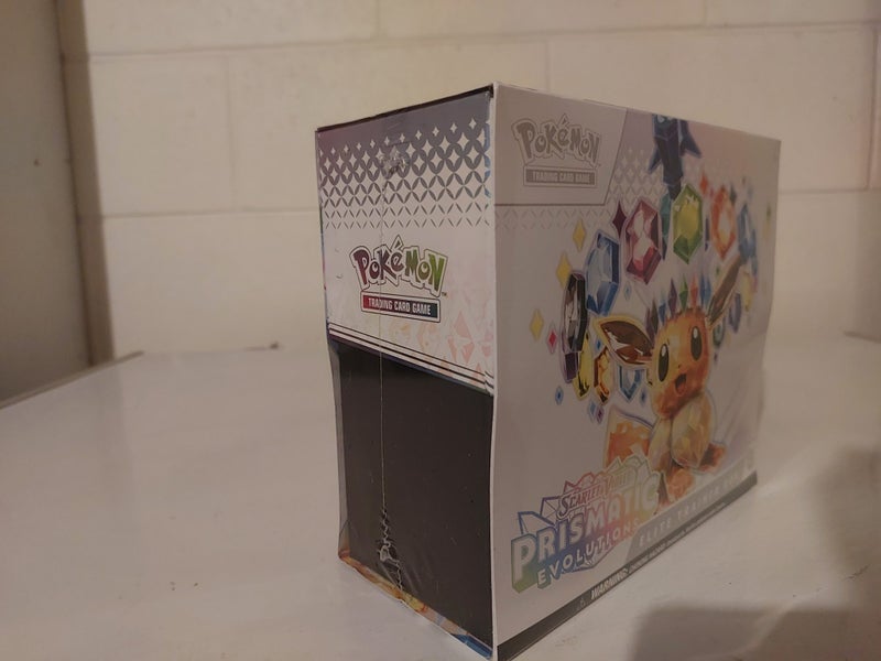 * $1 RESERVE * POKÉMON PRISMATIC EVOLUTIONS E.T.B Carousel 2