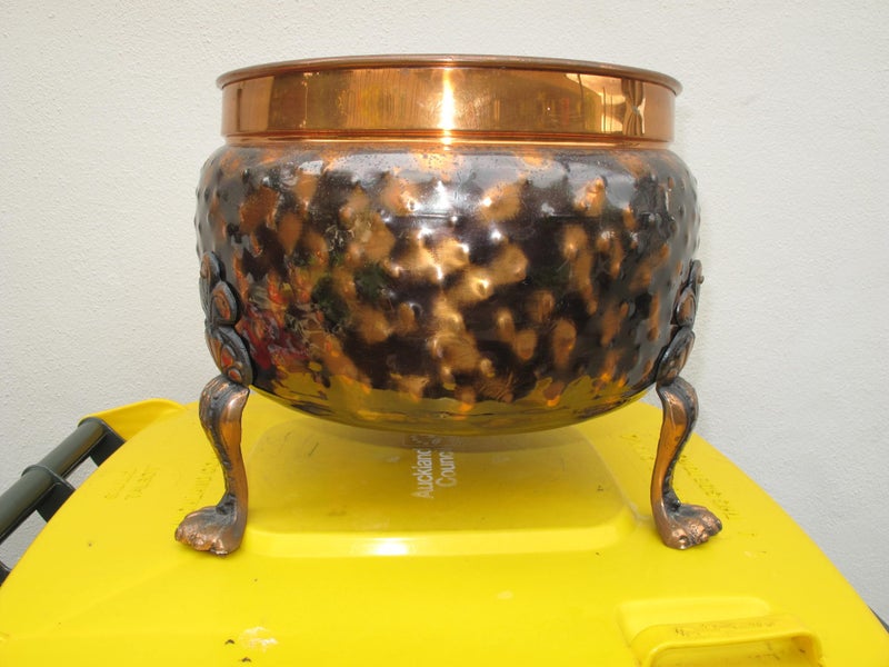 A solid copper pot. Carousel 1