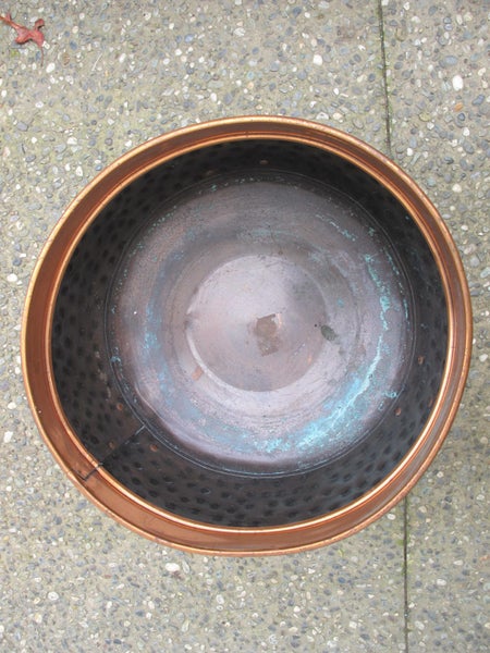 A solid copper pot. Carousel 2