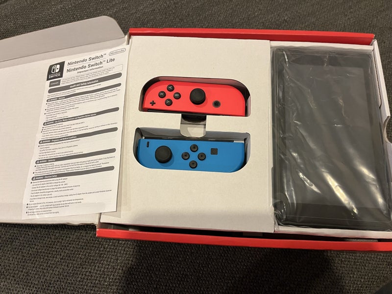 OG Nintendo Switch w/ original box Carousel 3