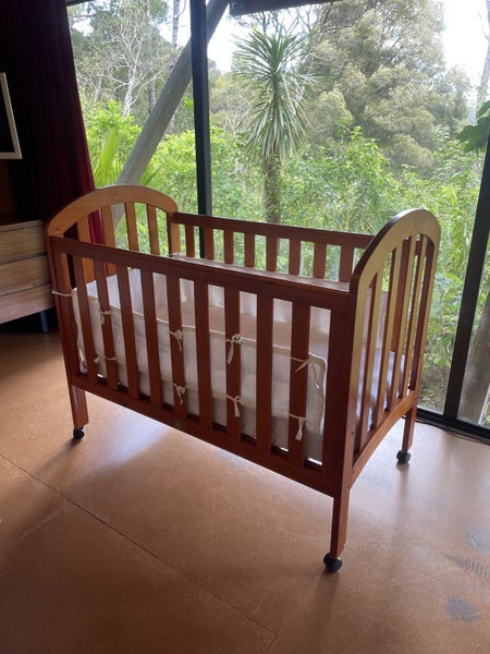Touchwood cot includes Stokke bumper & waterproof sheets Carousel 2