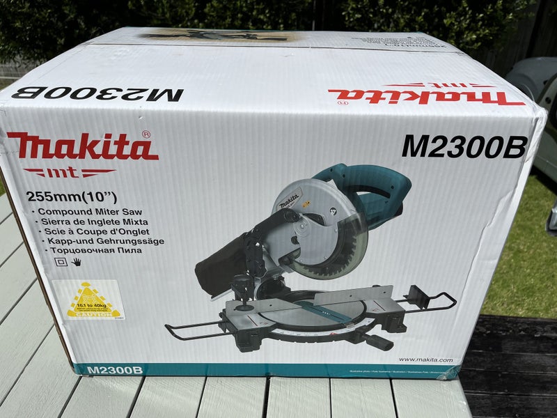Makita 255 mm (10 inch) Compound Mitre Saw and Toolshed Stand64042596620801110