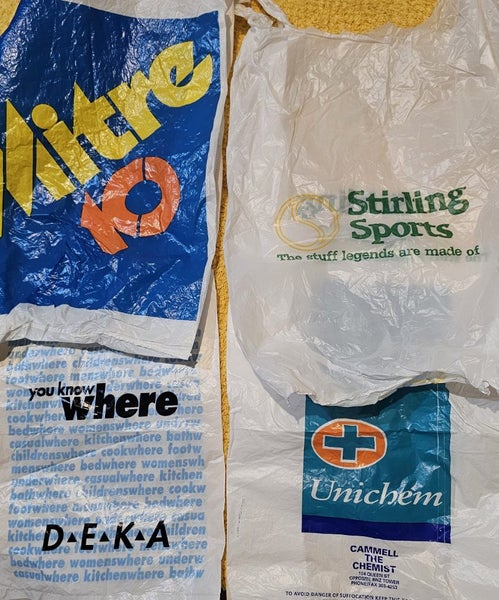 Shopping bags plastic bygone era (now paper) Carousel 12