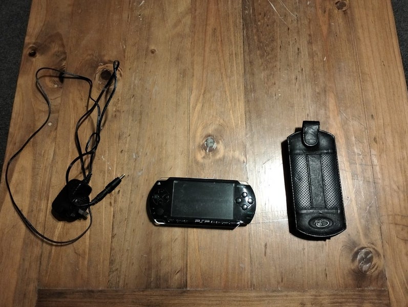 Sony PSP Console + 18 Games + Case + Charger (Faulty – Powers Off Quickly) Carousel 2