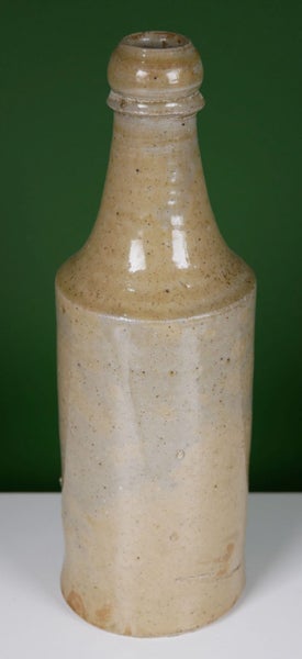 Attractive, Crudely made c1850s All Tan Stout / Porter Bottle Carousel 1