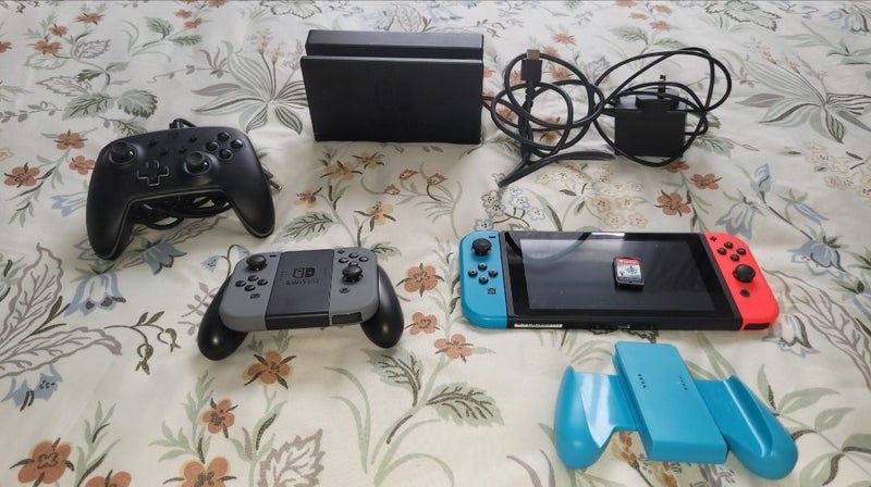 (PRICE REDUCED!) Nintendo switch with pokemon sword game SD card and accesories Carousel 1