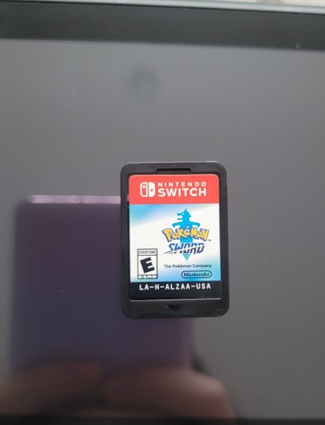 Nintendo switch with pokemon sword game SD card and accesories64052995443331112