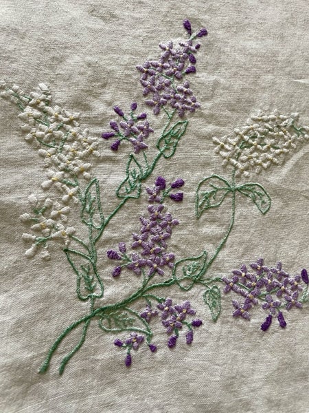 A lovely pure white linen, heavily hand embroidered Vintage Linen Tablecloth Carousel 1