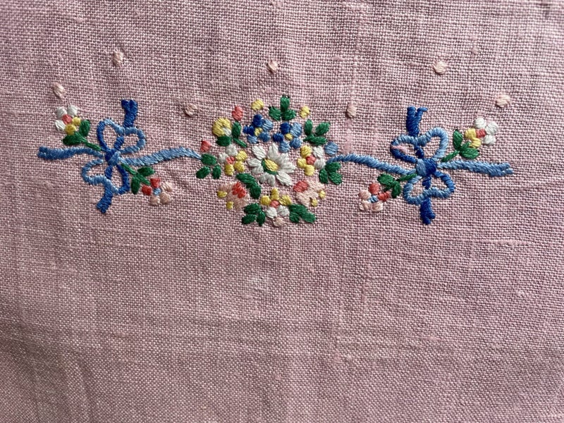 A lovely pink linen embroidered hand towel Carousel 1
