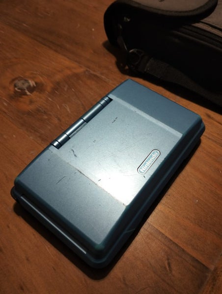 Nintendo DS (Blue) + 7 Games + Case – Untested Carousel 4