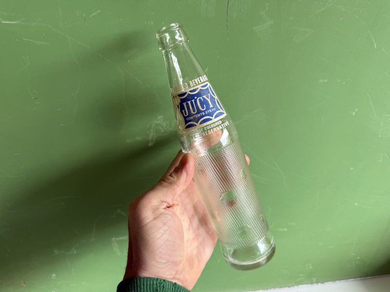 Vintage soda bottle Jucy Auckland made Carousel 1