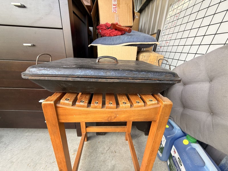 cast iron roaster or roasting pan with a lid. Carousel 1