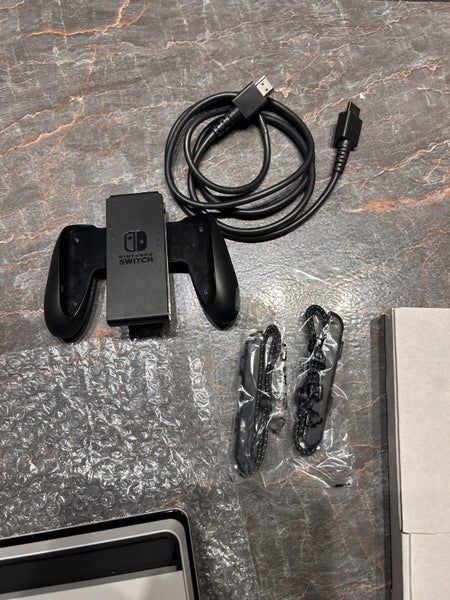 Nintendo Switch OLED + Pokemon Violet Carousel 5