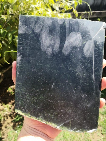 Pounamu greenstone carving big dark Translucent Tiki slab Carousel 1