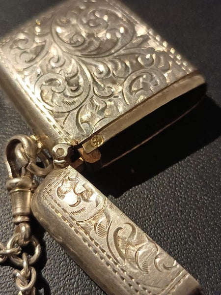 Sterling silver sovereign case and chain Carousel 12