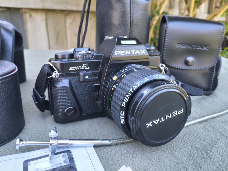 Pentax Super F1 A - 35mm SLR film camera and accessories Carousel 1