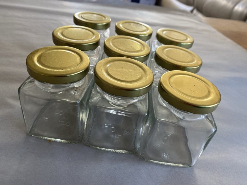 Small glass jars with gold lids Carousel 1