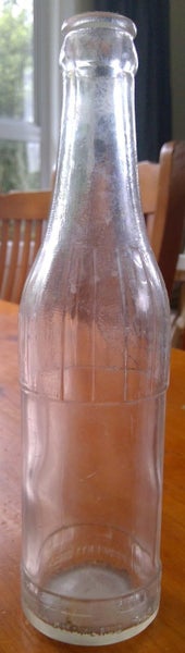 Grey & Menzies LTD Auckland bottle Carousel 2