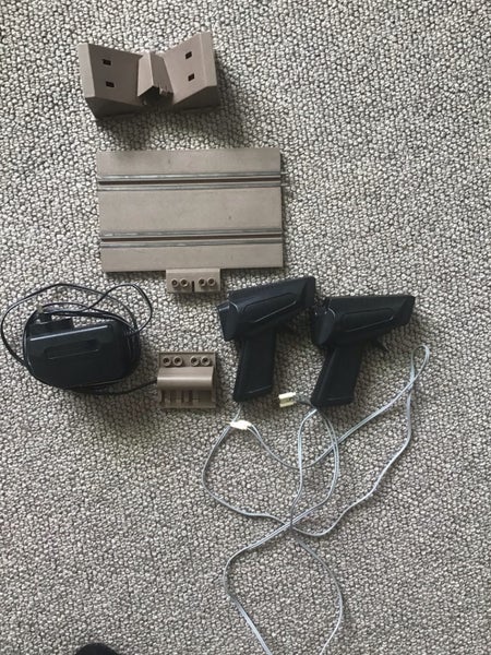 Slot car remotes and track Carousel 1