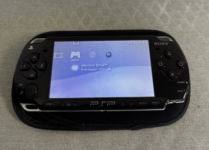 PSP 2000 – Piano Black | 64GB | Fully Set Up64142345020803111