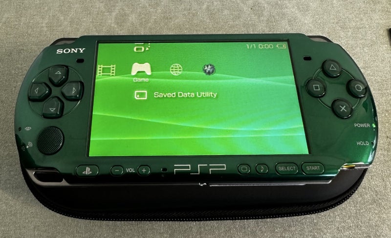 PSP 3000 – Carnival Green | 64 GB | Fully Set Up64142346016513111