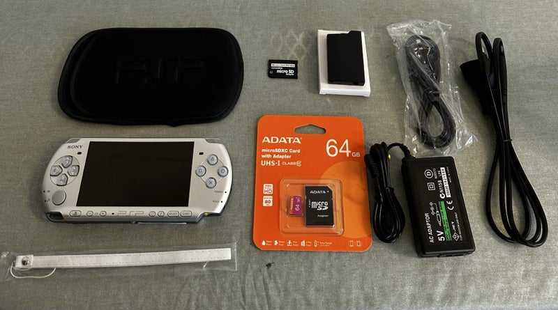 PSP 3000 – Mystic Silver | 64GB | Fully Set Up64142347953025110