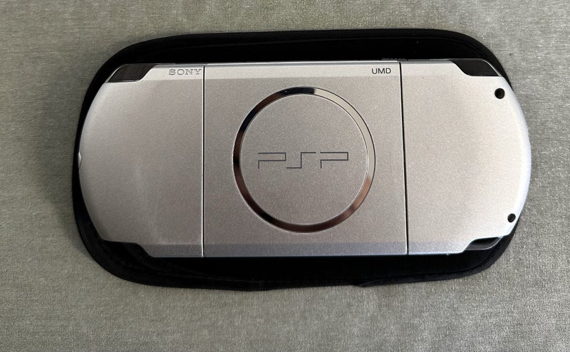 PSP 3000 – Mystic Silver | 64GB | Fully Set Up64142347953025112