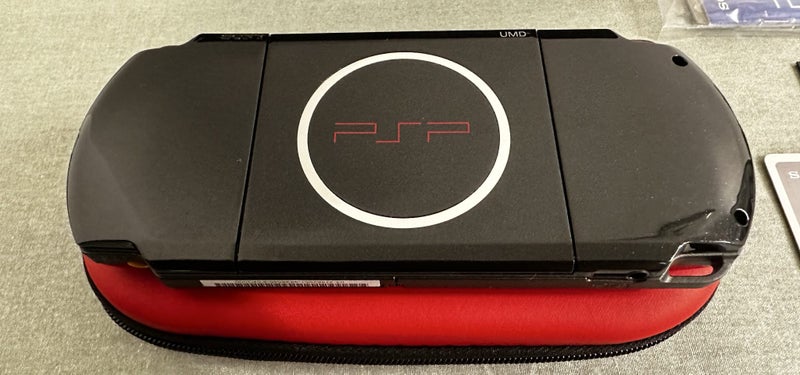 PSP 3000 – Radiant Red | 64 GB | Fully Set Up64142346333315112