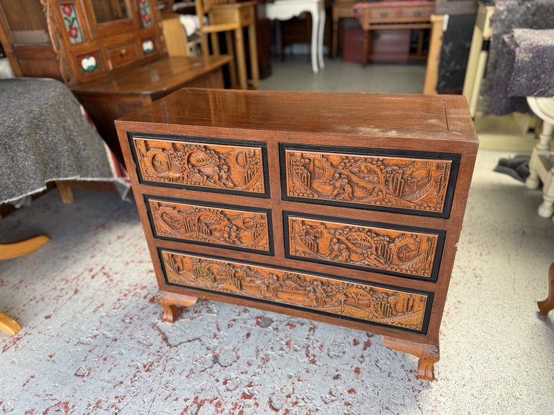 Mid Century Solid Decorative Heavily Carved Teak Chest of Drawers Carousel 1