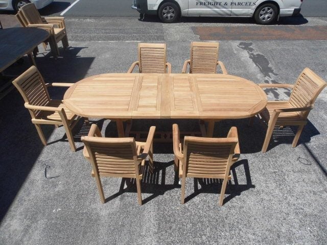 OUT DOOR FURNITURE-TEAK TABLE AND 6 CHAIRS. Carousel 1