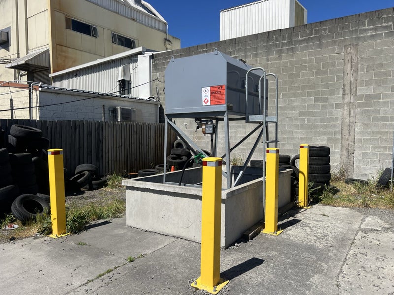 1,800 L Gravity-Fed Petrol Storage Tank with Concrete Bund and Safety Bollards64305819715202110