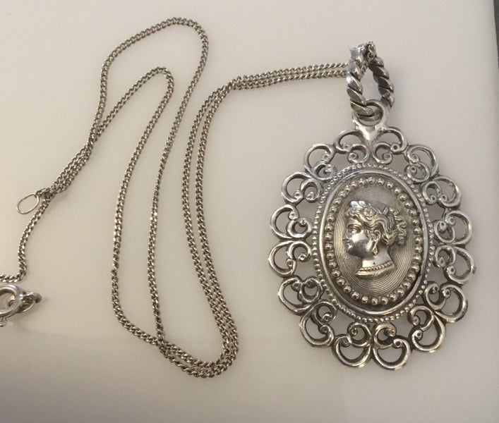 Silver Cameo Relief Pendant With Chain Carousel 1