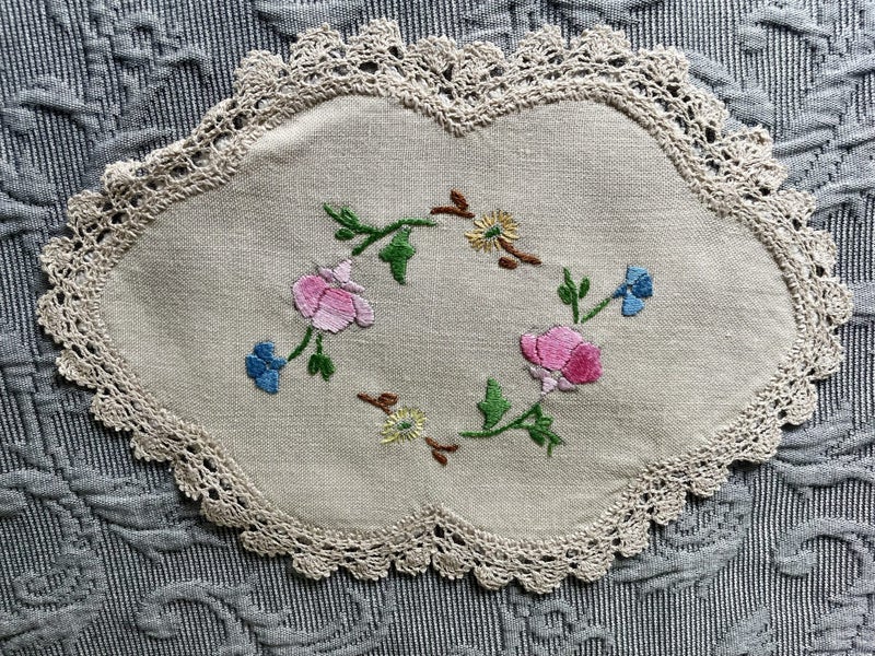 A perfectly pretty hand embroidered Linen Doily Carousel 1