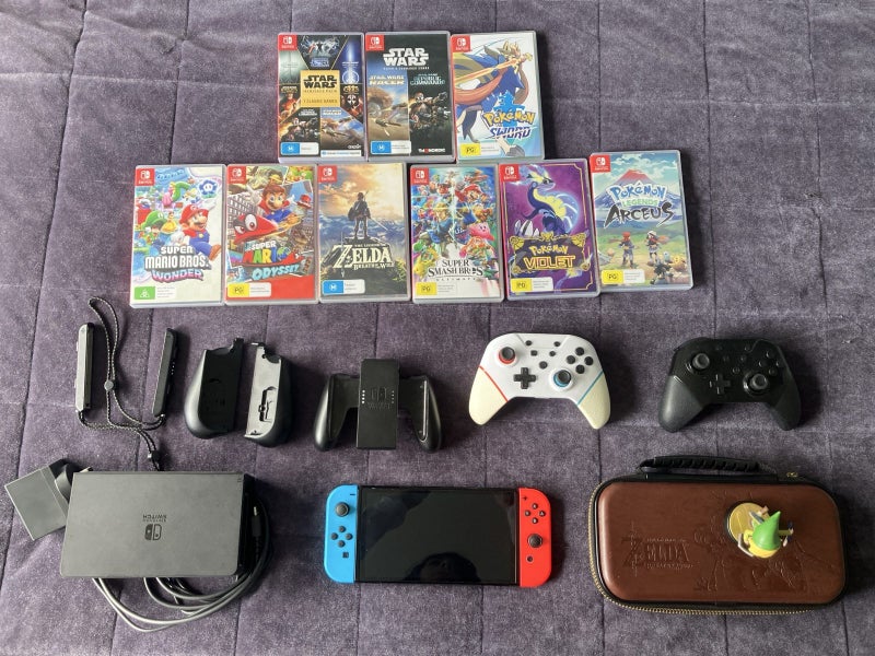 Nintendo switch OLED + Games & Accessories64194548276739110