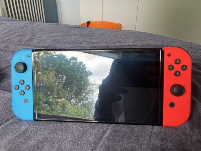 Nintendo switch OLED + Games & Accessories64194548276739111