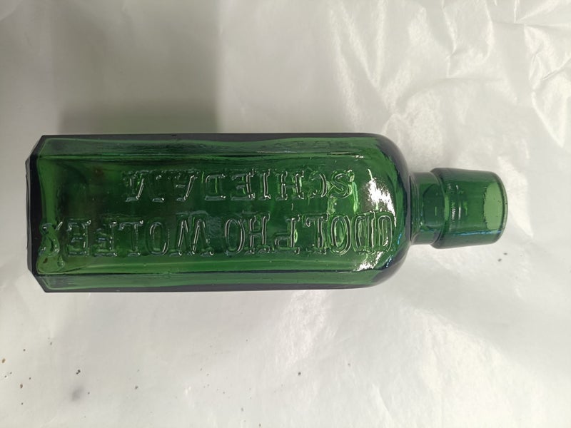 BT10 1738 - Small Aromatic Schnapps Green Glass Bottle - M.Moss & Co Limited Carousel 1