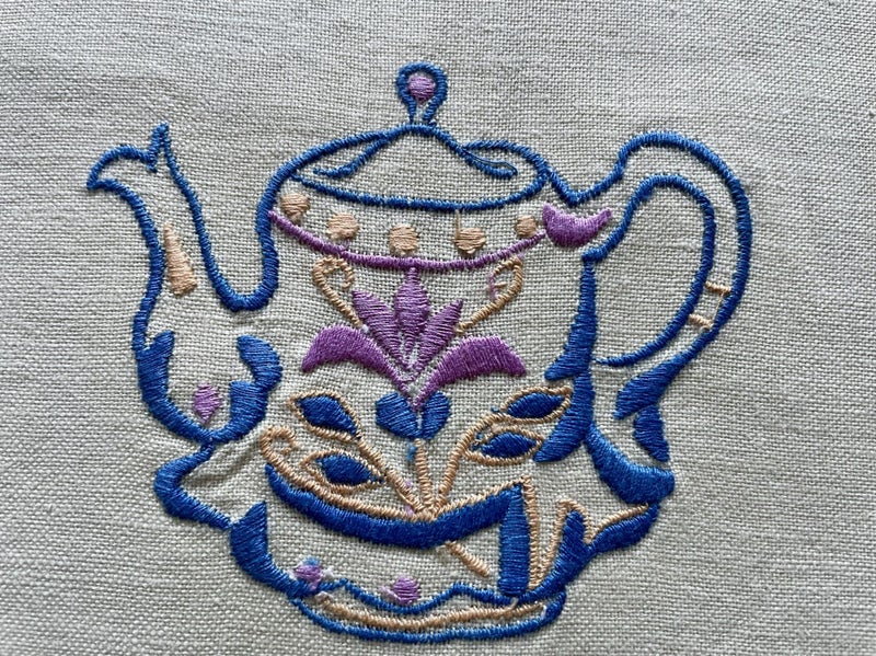 A cute little embroidered vintage linen Cover Carousel 1