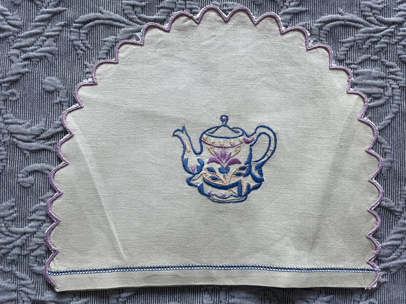 A cute little embroidered vintage linen Cover Carousel 2