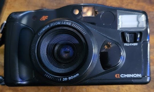 CHINON AUTO 5501 35 mm CAMERA IN WORKING ORDER. Carousel 1