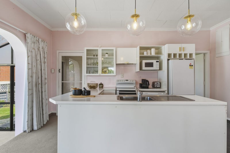 Adorable Home with Dream Garaging!64230700339203112