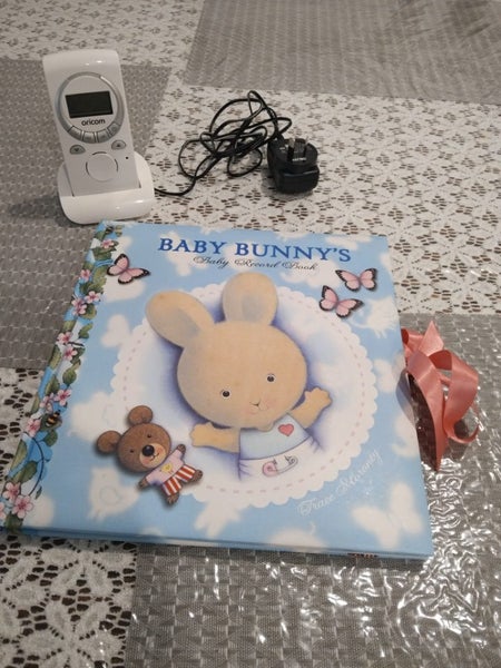 Plastic cups and jugs. Baby monitor and book Carousel 3