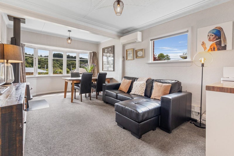 Sunny 1950s Brick Home with Space & Potential64248545910529112