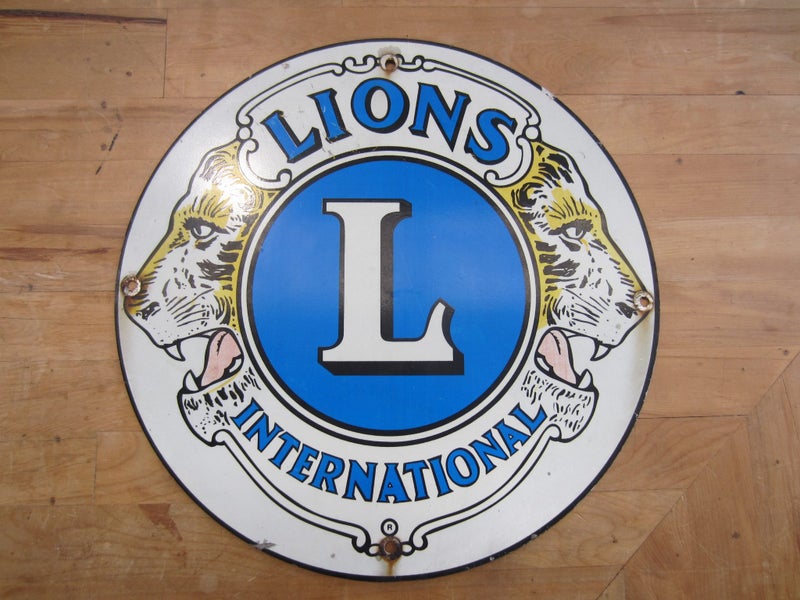 Vintage Lions International Metal Sign Carousel 1