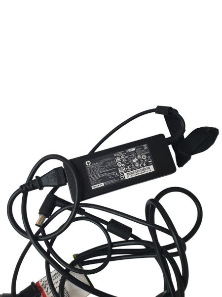 HP Original 65W Adapter Output: 18.5V 3.5A Carousel 1
