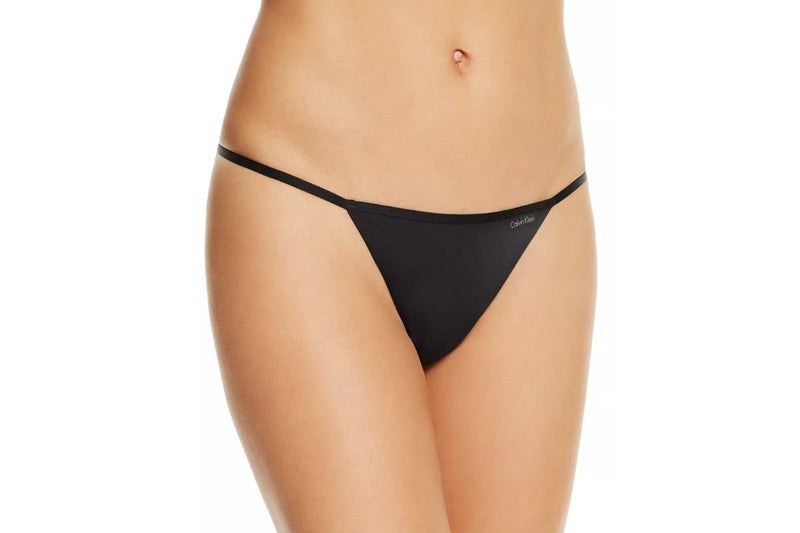 Calvin Klein Women's Sleek String Thong (Black, Size M) Carousel 1