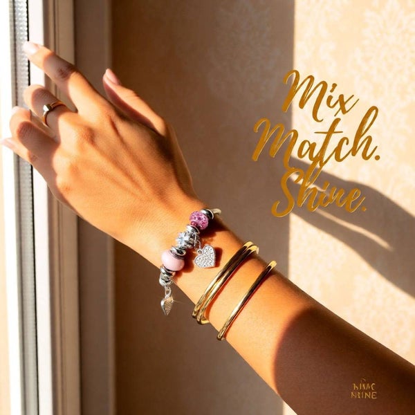 Elegant Heart Stainless Steel Asymmetrical Plated Bangle Carousel 12